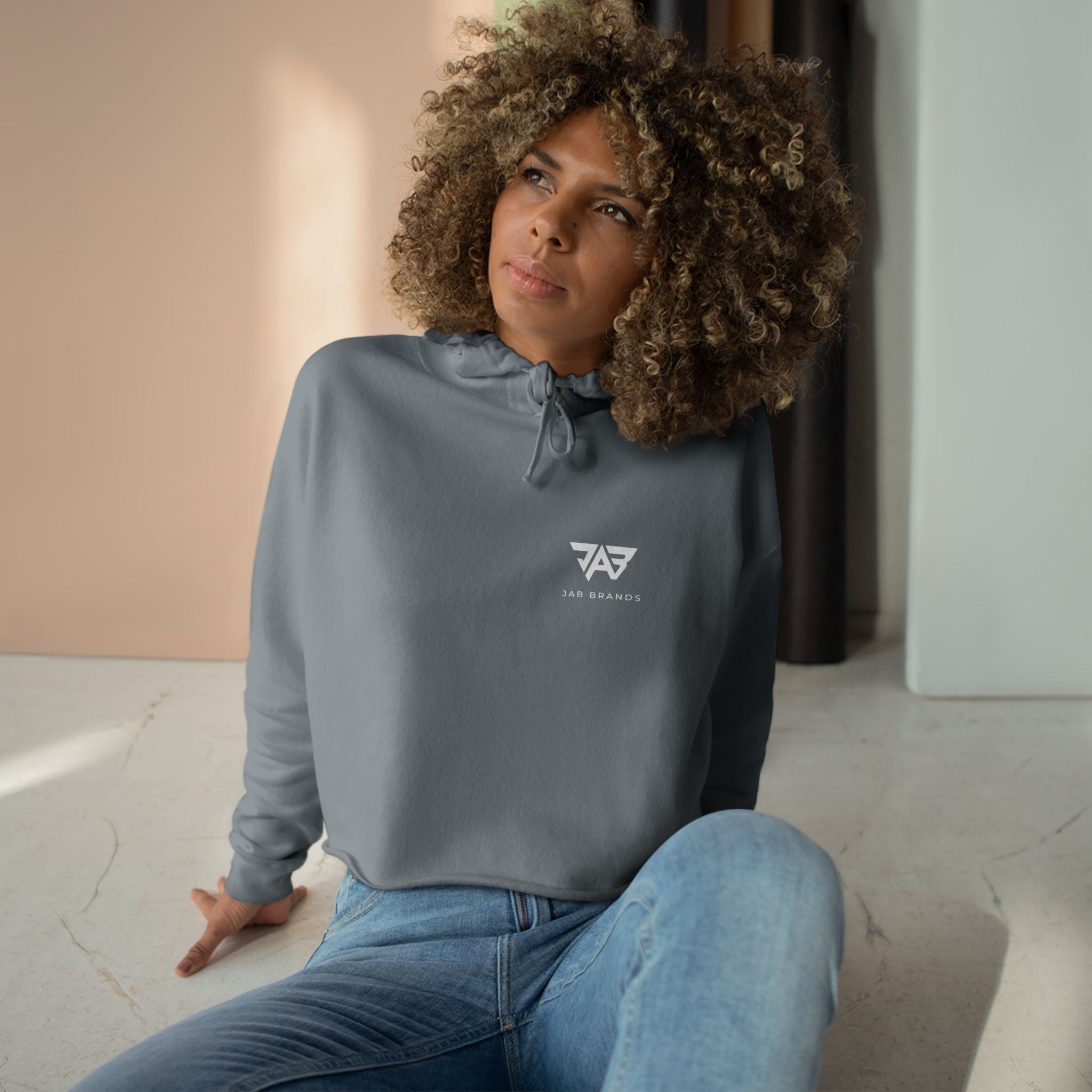 JAB Logo Crop Hoodie – Black Cropped Pullover with Small Chest Emblem
